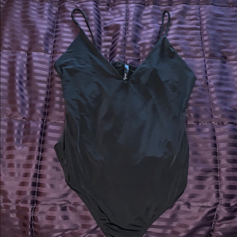 NWOT Shelly black sleek bodysuit